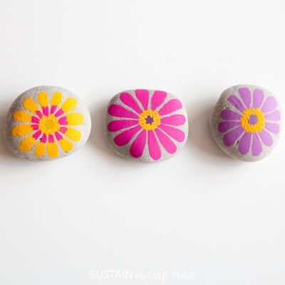 Flower Pebble Painting Idea by Sustain My Craft Habit