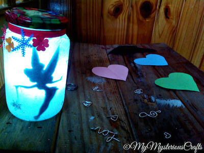  3. DIY Tinkerbell Fairy Jar Lantern by Shine Crafts