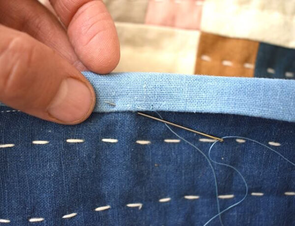 How to Bind a Quilt With Mitered Corners | Written Guide 8 Finish the quilt by hand sewing the binding to the front of the quilt by Farmandfolk