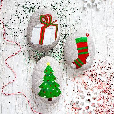 Around The Christmas Tree Painted Rocks by Deco Art