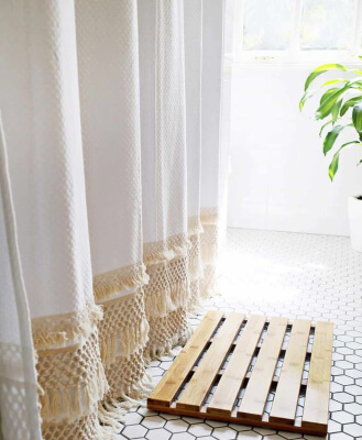 DIY Macrame Shower Curtain by A Beautiful Mess