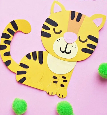 Artesanía de tigre de papel para niños en edad preescolar por Color Me Crafty