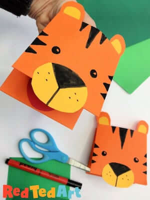 Manualidad de marionetas de tigre de papel por Red Ted Art