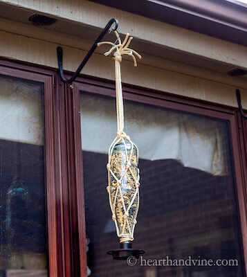 DIY Macrame Water Bottle Bird Feeder by Hearth And Vine