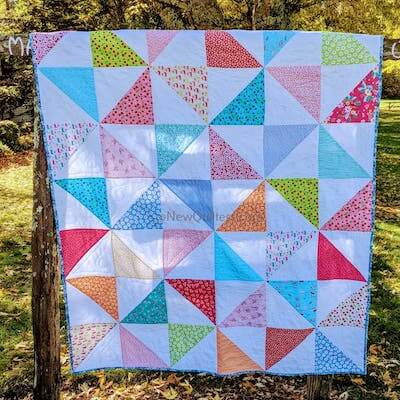 Pinwheel Layer Cake Lap Quilt Pattern de New Quilters