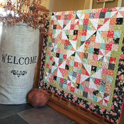 Pinwheels Over Patchwork Quilt Pattern by Carried Away Quilting
