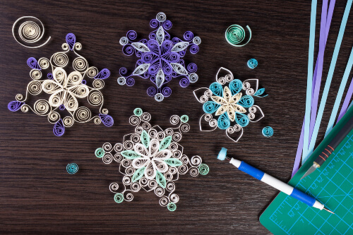 Quilling snowflakes is perfect for creating embellishments for greeting cards or decorative items