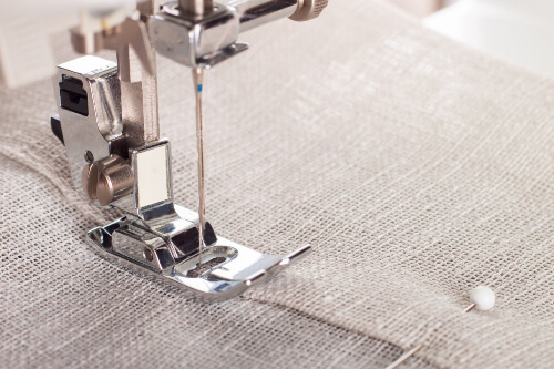 Rolling hem foot is a sewing machine foot to create neat and professional-looking narrow hems