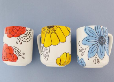 Coffee Mugs With Hand-Drawn Flowers from HGTV
