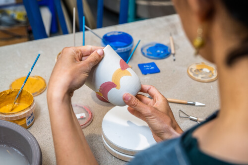 Pottery painting is a calming way to express your creativity